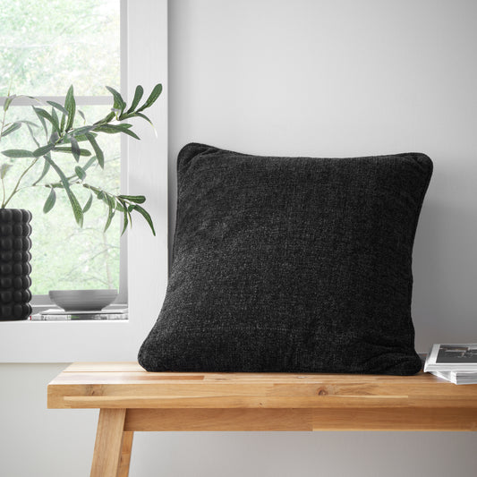 Wilson Plain Chenille Filled Cushion in Black by Catherine Lansfield