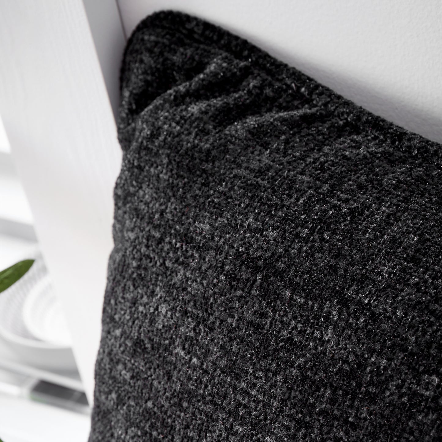 Wilson Plain Chenille Filled Cushion in Black by Catherine Lansfield