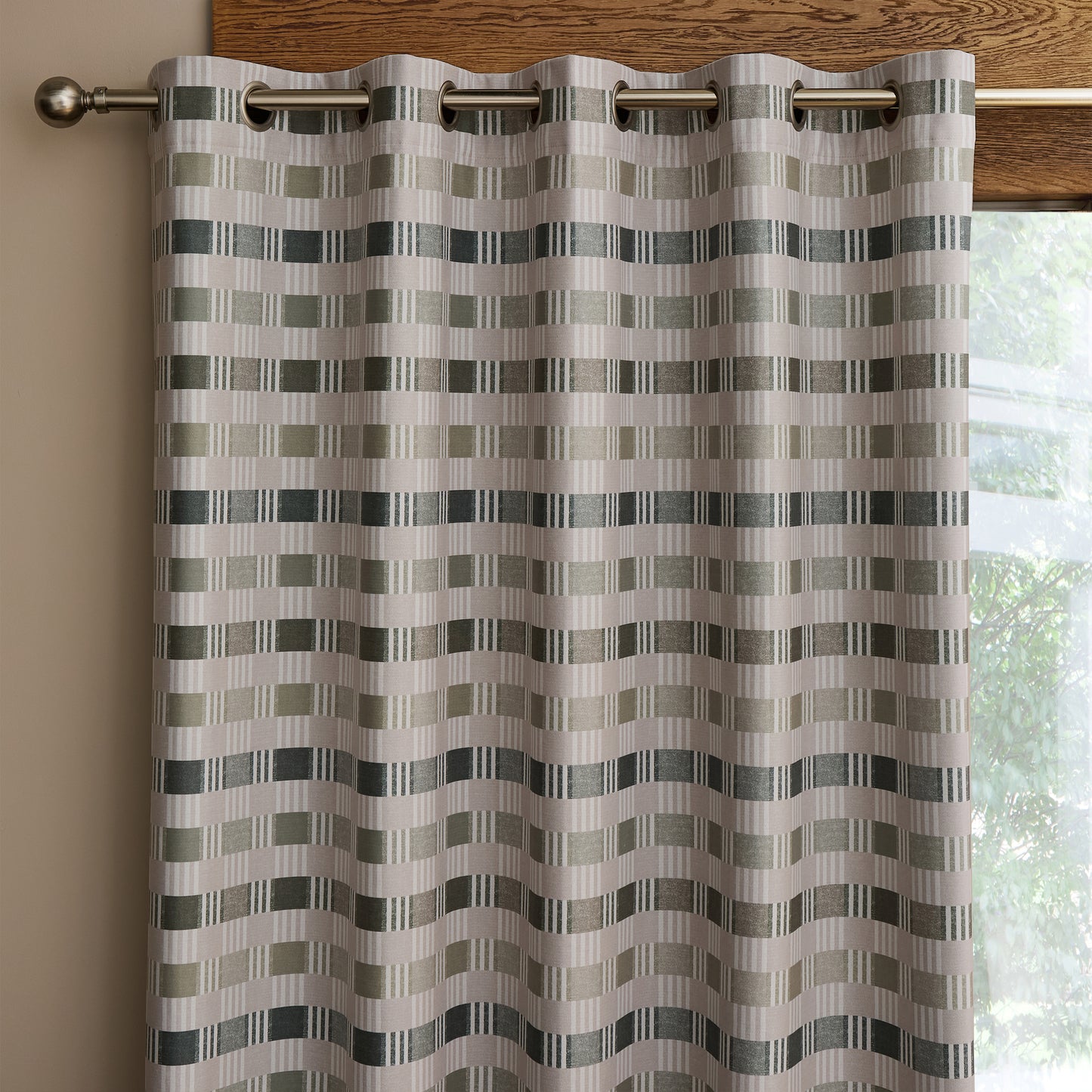 Wilson Check Blackout Thermal Eyelet Curtains in Green by Catherine Lansfield