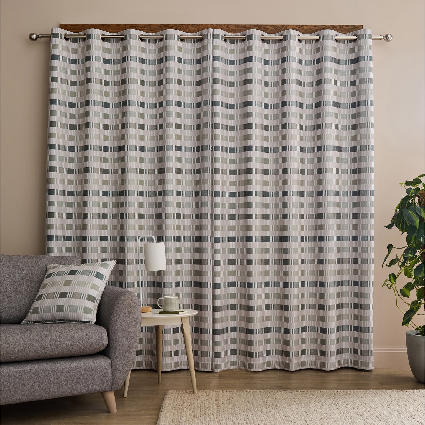 Wilson Check Blackout Thermal Eyelet Curtains in Green by Catherine Lansfield