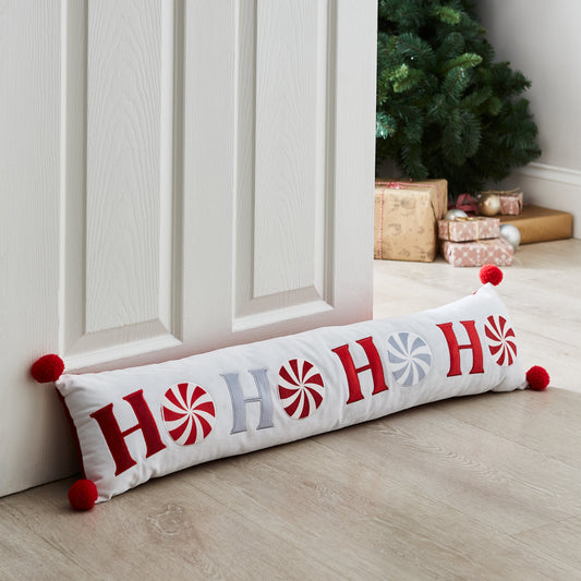 Christmas Ho Ho Ho Door Draught Excluder in White / Red by Catherine Lansfield