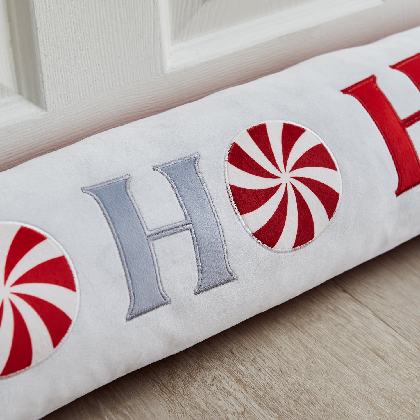 Christmas Ho Ho Ho Door Draught Excluder in White / Red by Catherine Lansfield