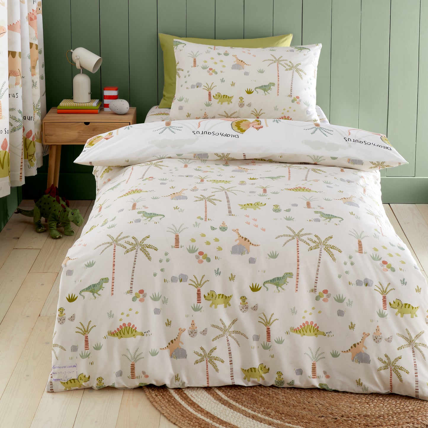 Sleepy Dino Reversible Duvet Cover Set in Green by Catherine Lansfield