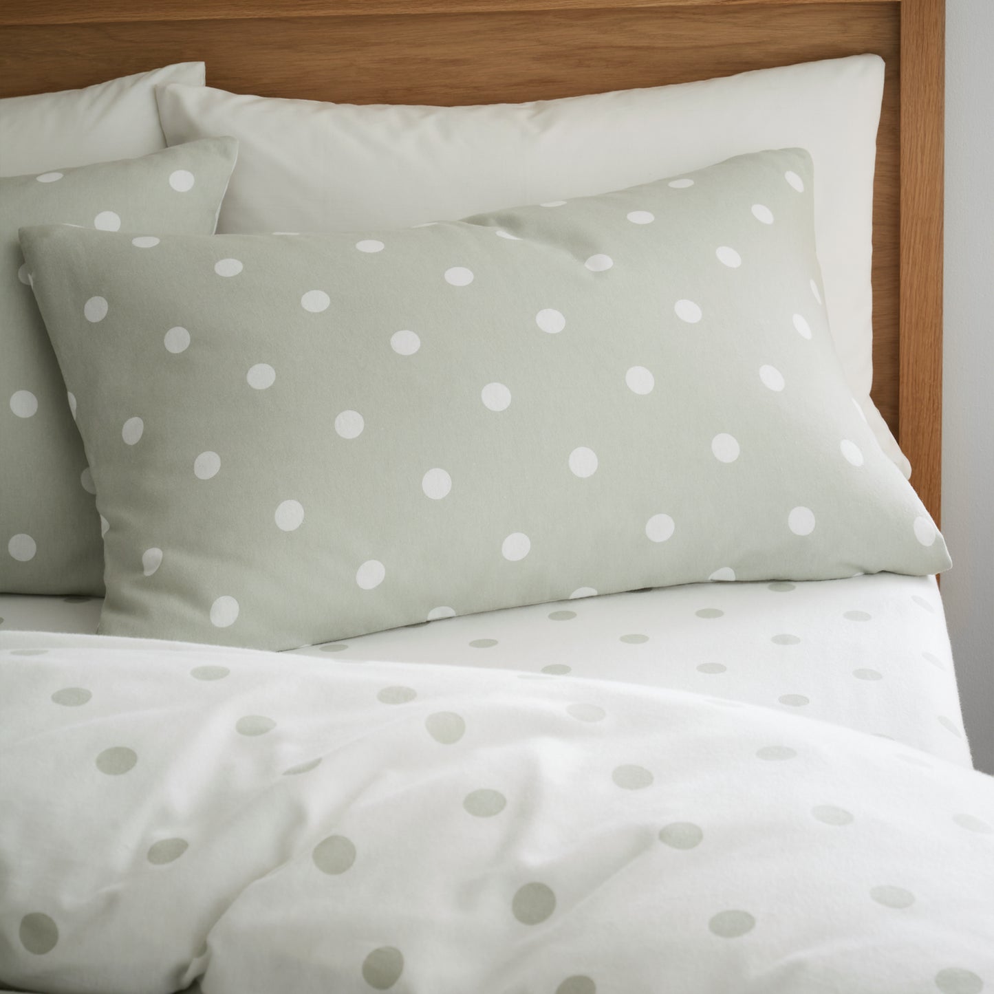 Brushed Polka Dot Cotton Reversible Duvet Cover Set in Green by Catherine Lansfield