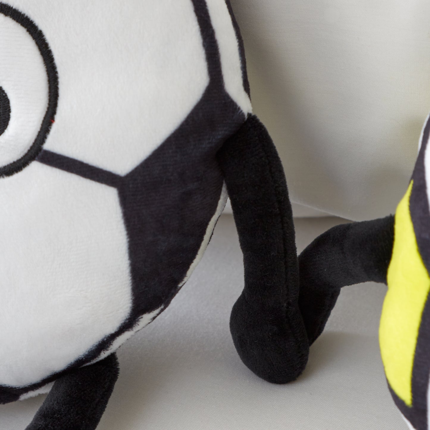 Forever Together Football Magnetic Hands Cushions in White / Black by Catherine Lansfield