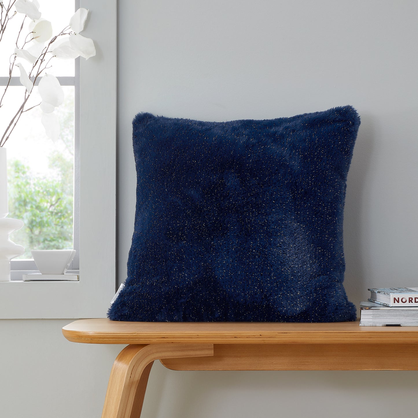 Cosy Glamour Fur Filled Cushion in Navy Blue by Catherine Lansfield