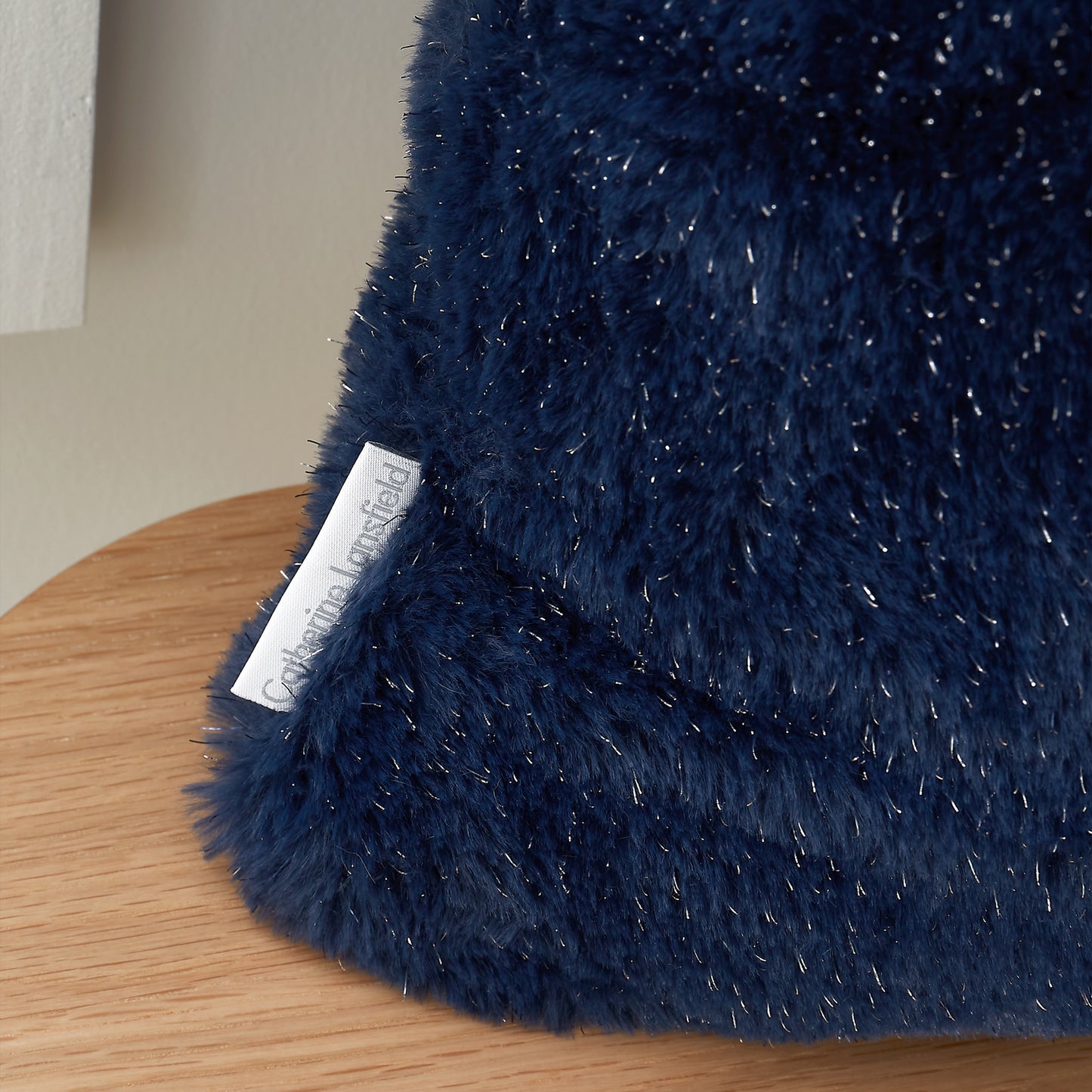 Cosy Glamour Fur Filled Cushion in Navy Blue by Catherine Lansfield