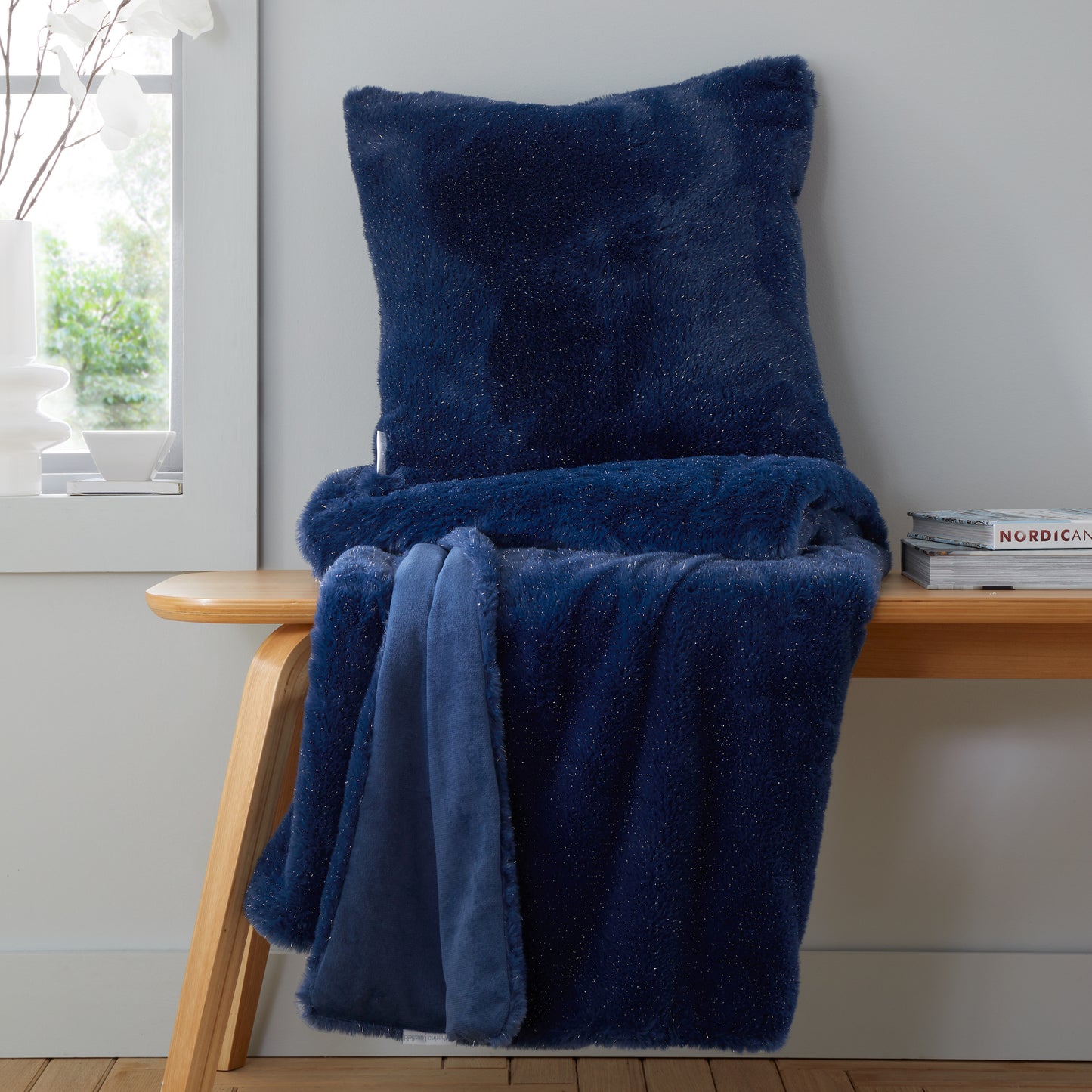 Cosy Glamour Fur Filled Cushion in Navy Blue by Catherine Lansfield