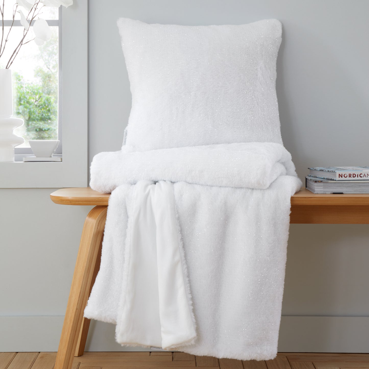 Cosy Glamour Fur Filled Cushion in White by Catherine Lansfield