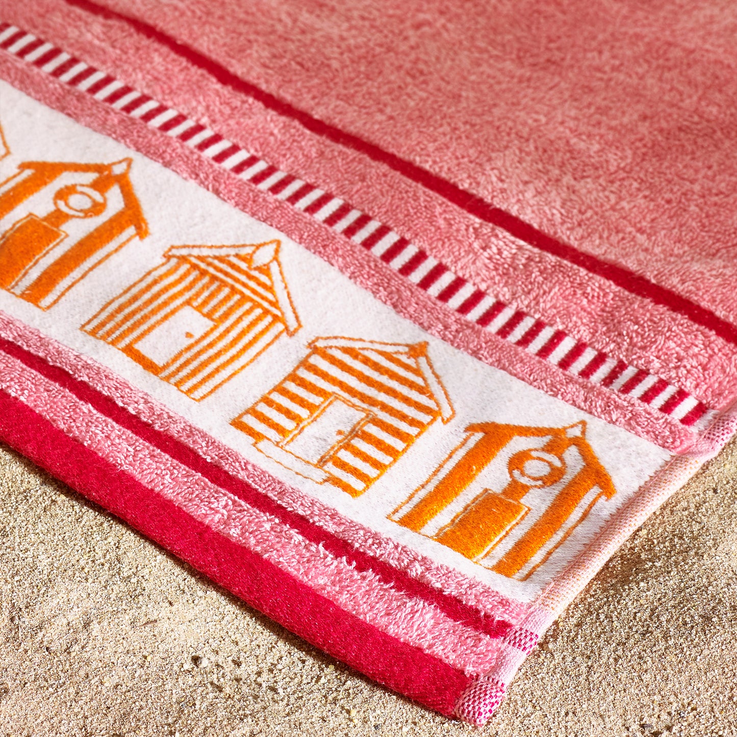 Beach Huts Cotton Extra Large Beach Towel in Coral by Catherine Lansfield