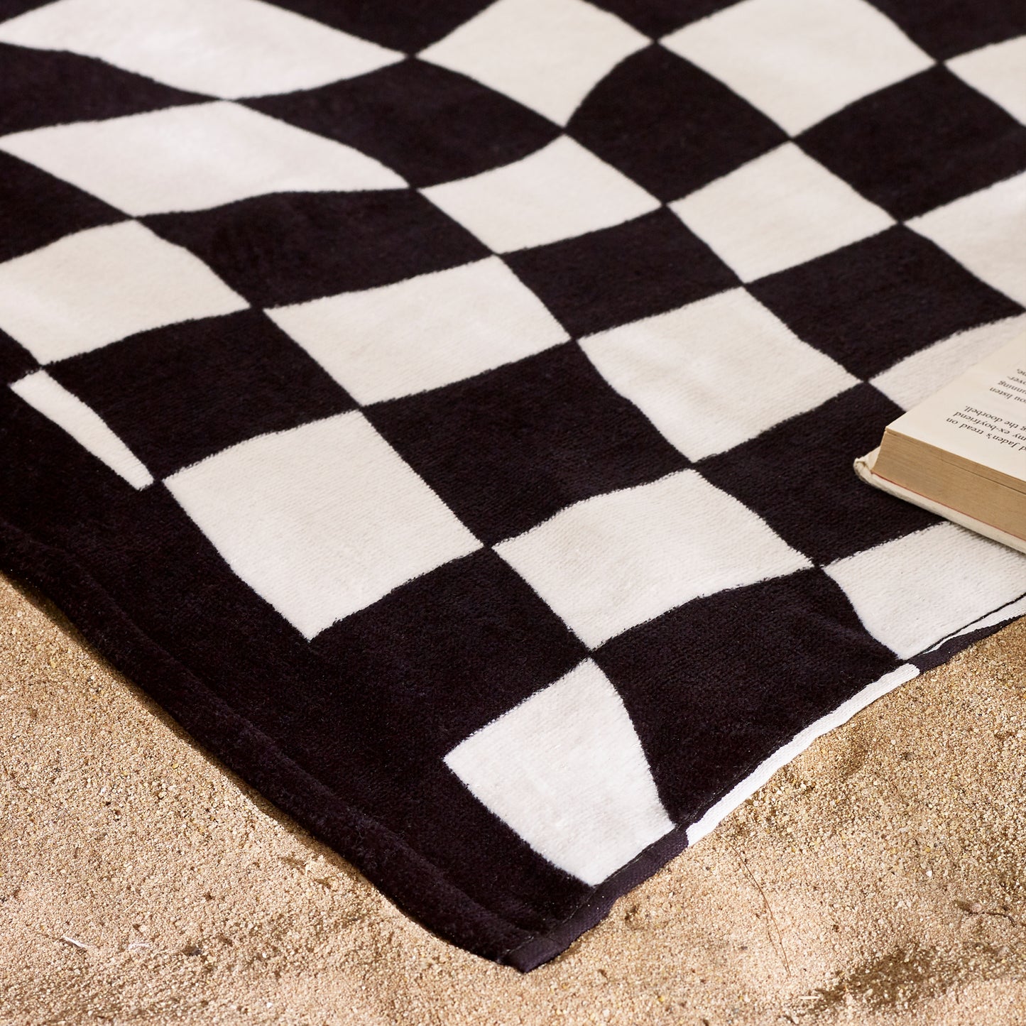 Checkerboard Cotton Beach Towel in Black White by Catherine Lansfield