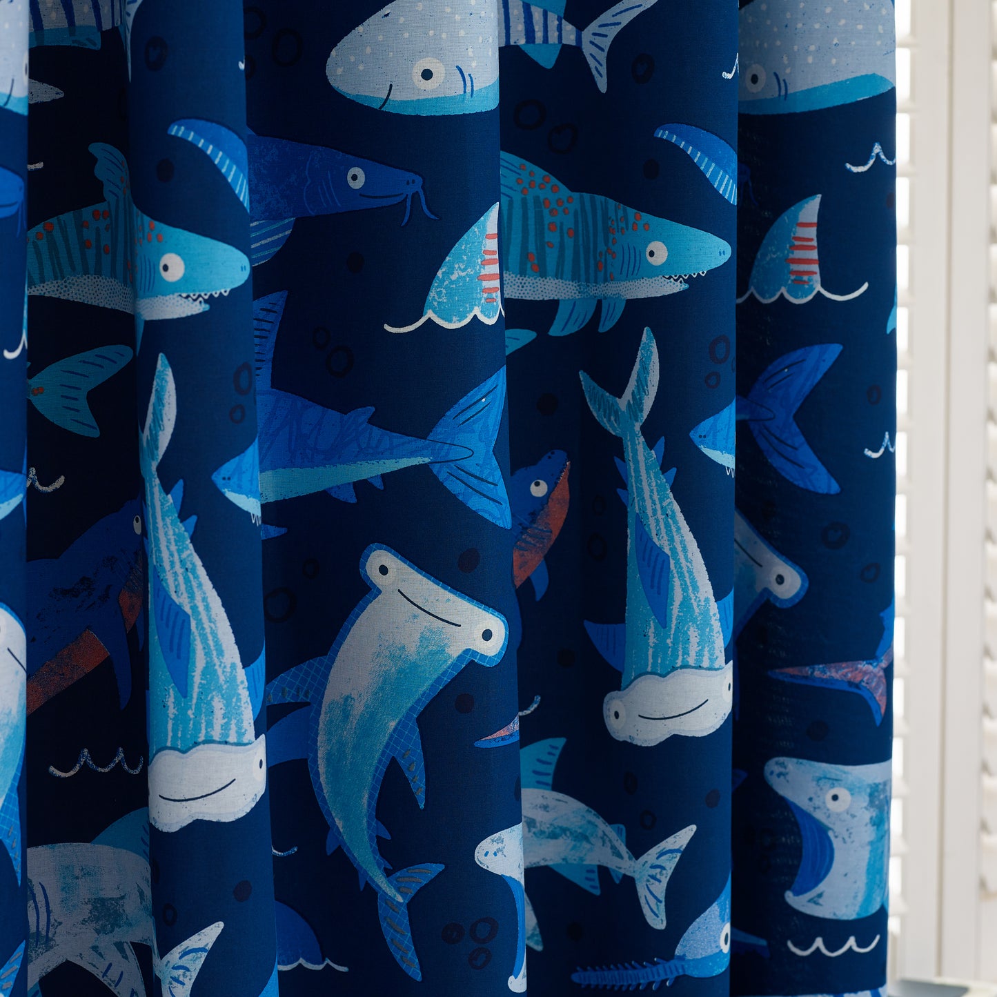 Jawsome Shark Fully Reversible Eyelet Curtain in Navy Blue by Catherine Lansfield Kids