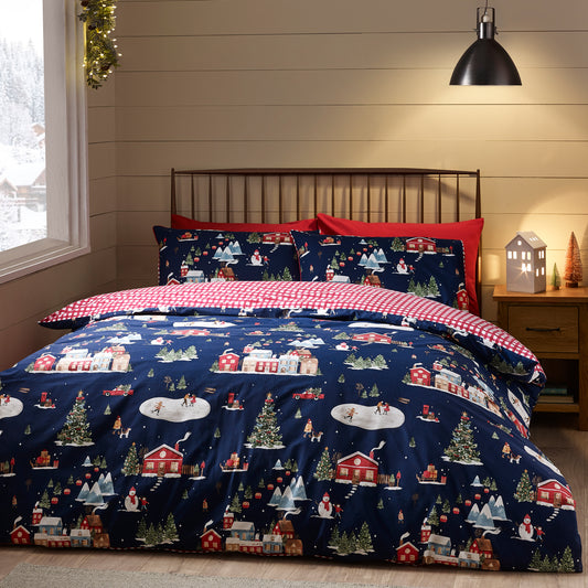 Christmas Ski Village Reversible Duvet Cover Set in Navy Blue by Catherine Lansfield
