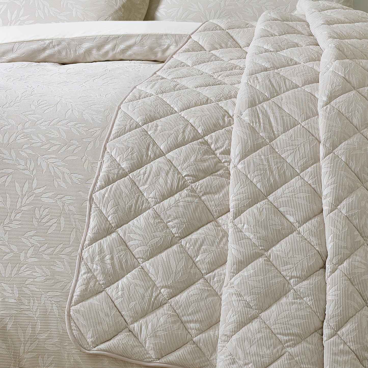 Corded Leaves Quilted Bedspread in Champagne Gold by Catherine Lansfield