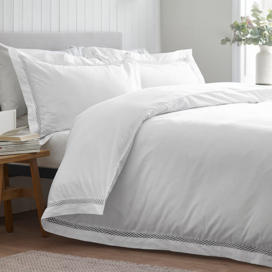Classic Lattice Lace Duvet Cover Set in White by Catherine Lansfield