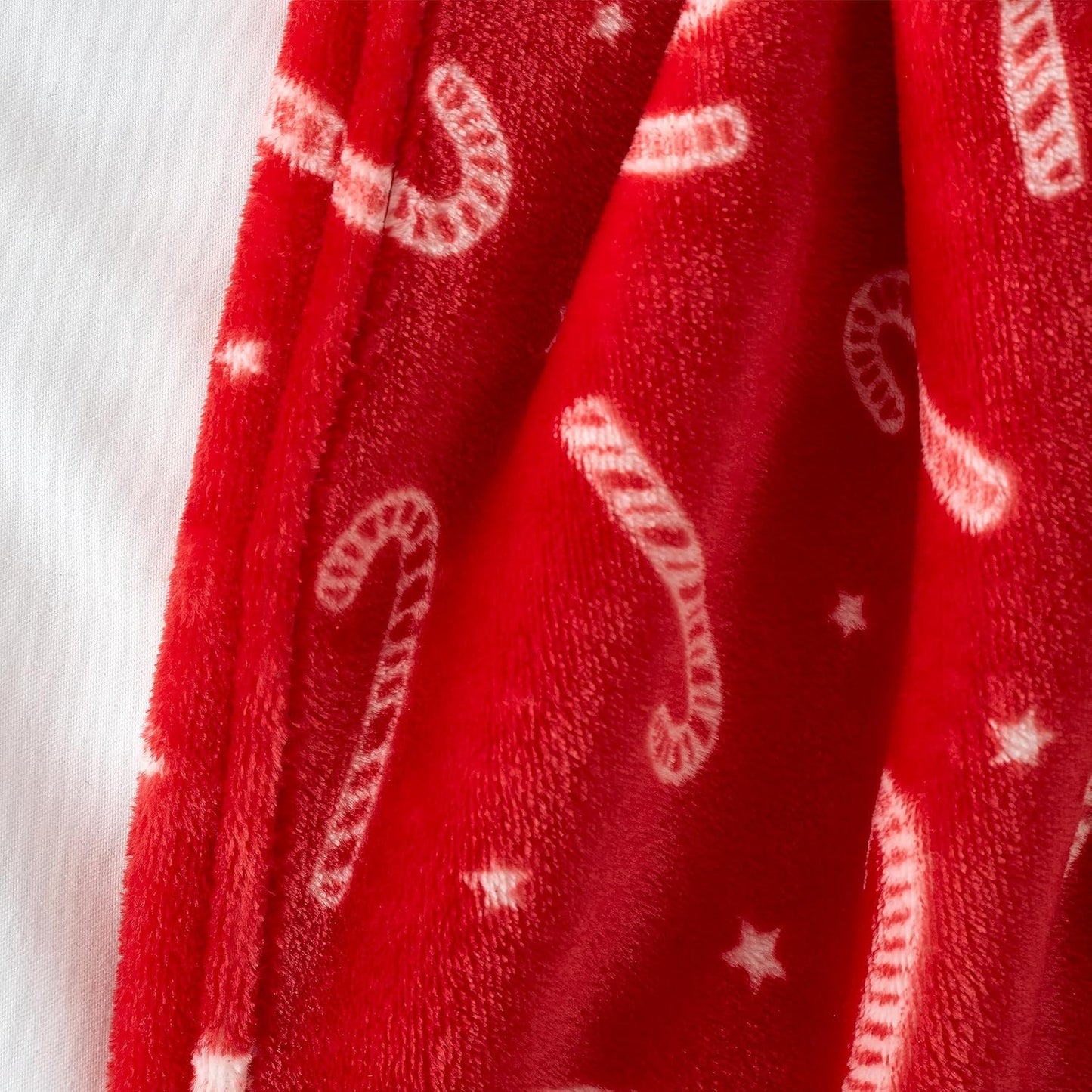 Christmas Candy Cane Throw by Catherine Lansfield