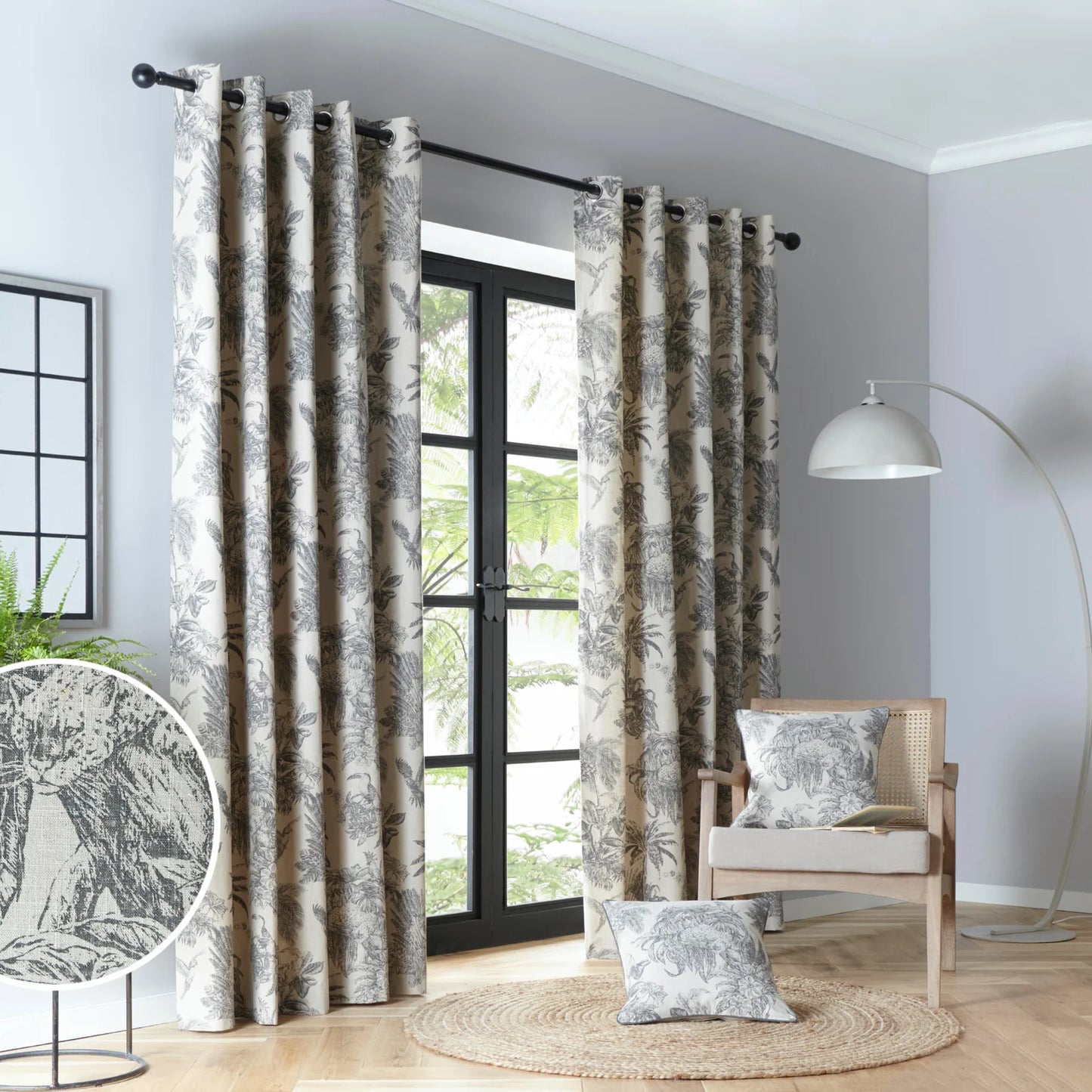 Saranda Jungle Lined Eyelet Curtains by Fusion in Charcoal