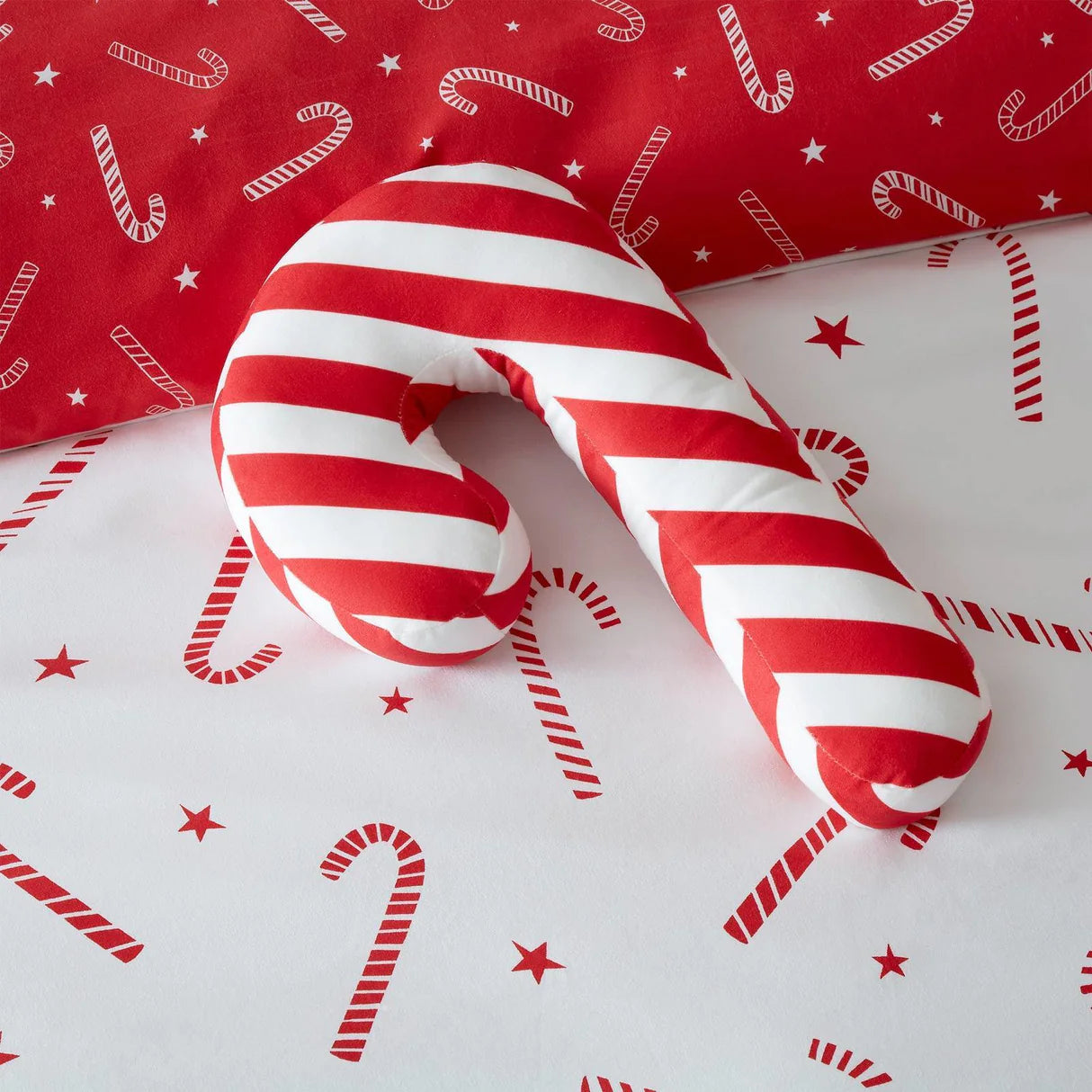 Christmas Candy Cane Shaped Cushion by Catherine Lansfield