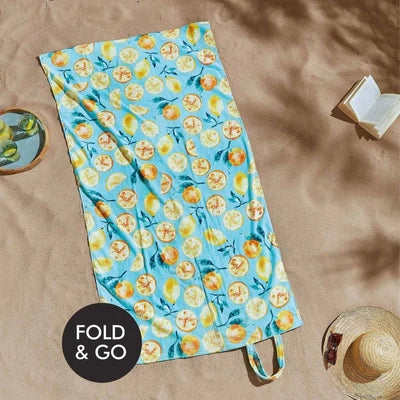 Summer Fruits Beach Towel in a Bag by Catherine Lansfield