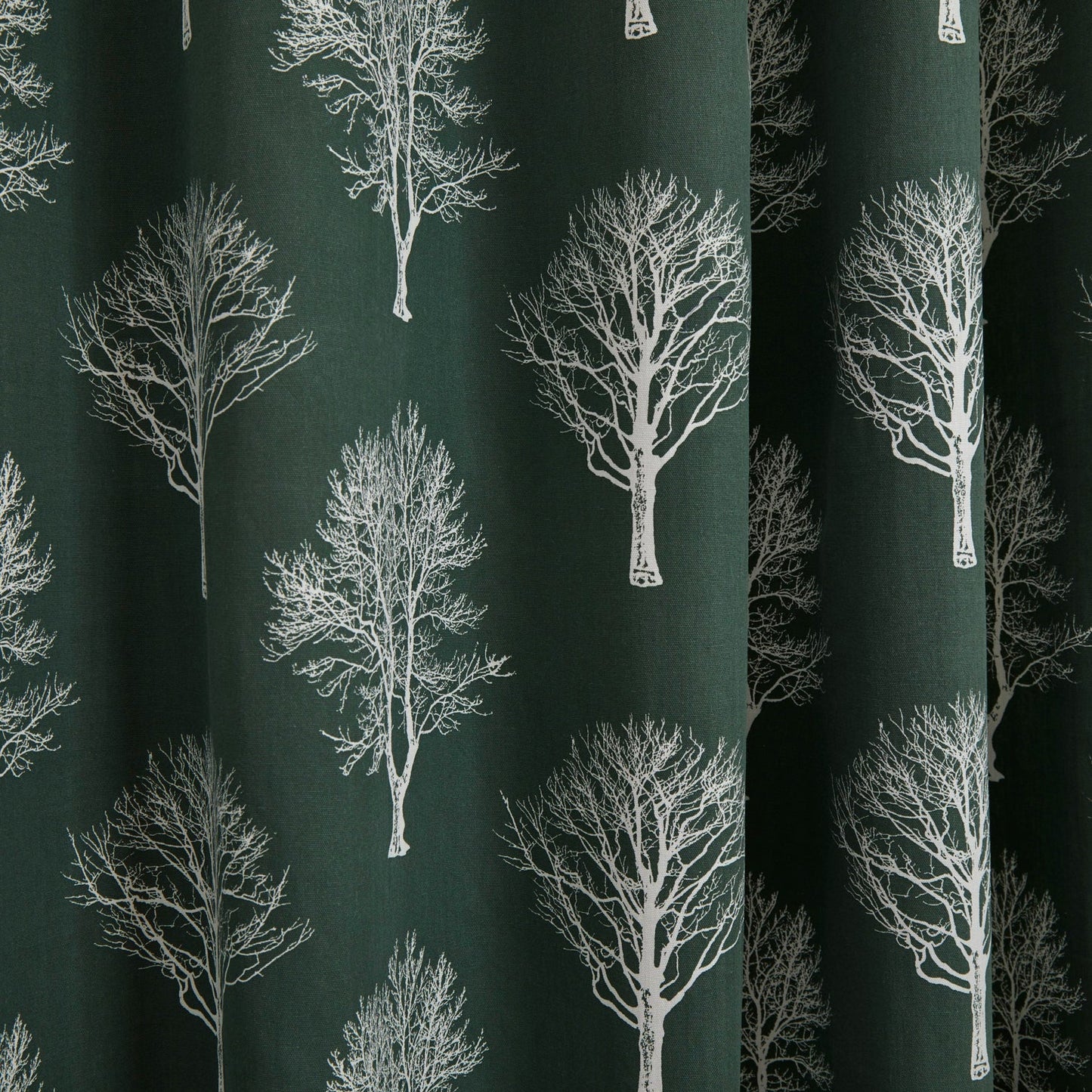 Woodland Trees Eyelet Curtains by Fusion in Bottle Green