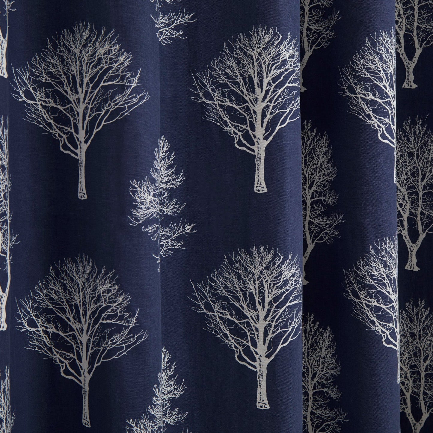 Woodland Trees Eyelet Curtains by Fusion in Navy